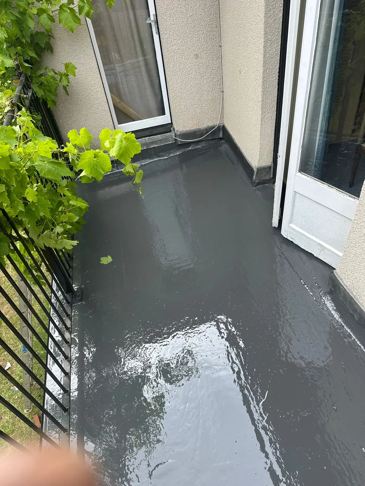 Finished GRP fibreglass balcony with a grey topcoat
