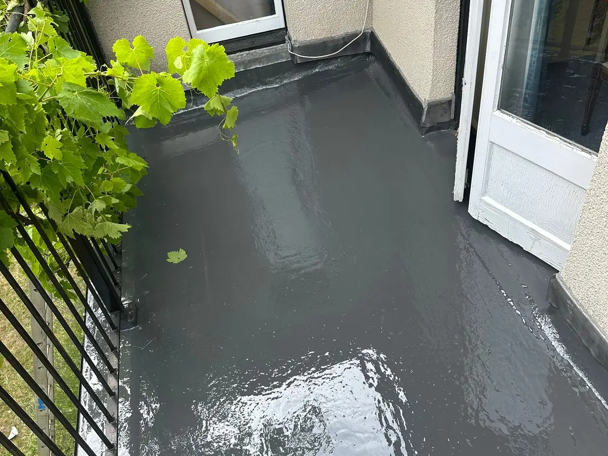 Finished GRP fibreglass balcony with a glossy grey topcoat