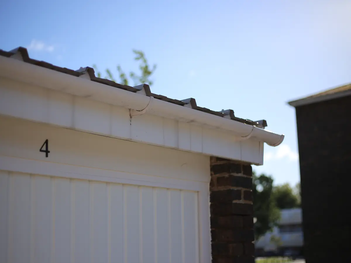 White uPVC fascia board above a garage door